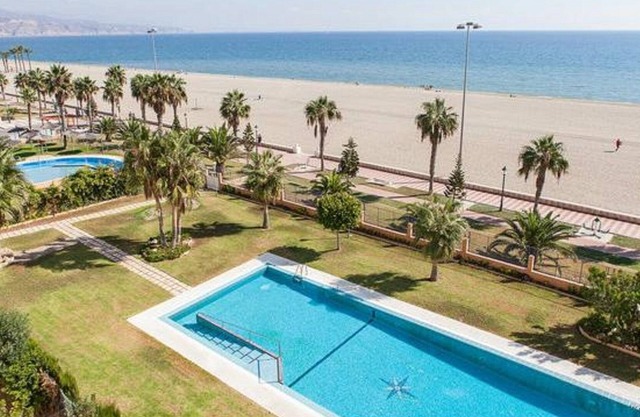 Beachfront apartment with pool