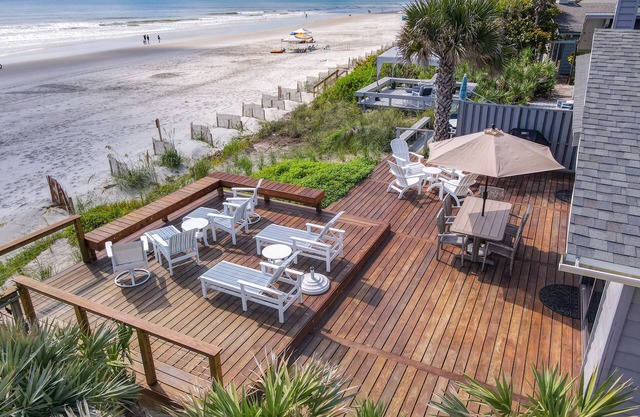 Beachfront Deck with steps down to the white sandy beach! Sea Dunes Sandcastle 1A
