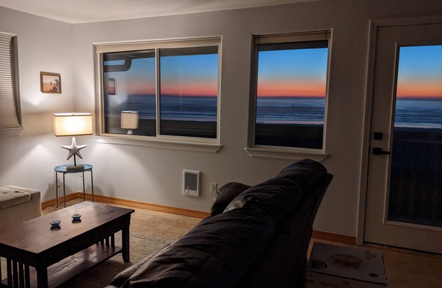 Beachfront Getaway - Stellar Views and Seconds from Town
