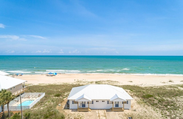 Beachfront, 2bed/1bath, ground level, screened in porch.