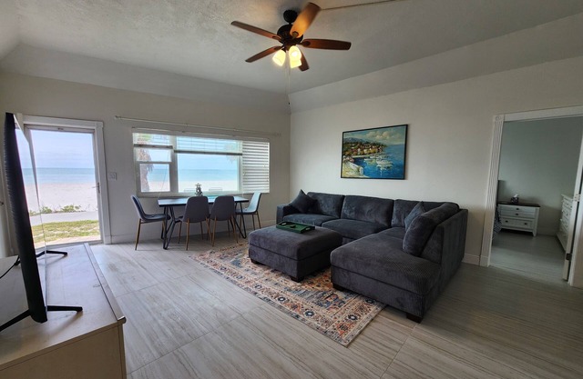 Beautiful 2/2 condo right on the beach with water view from every room.