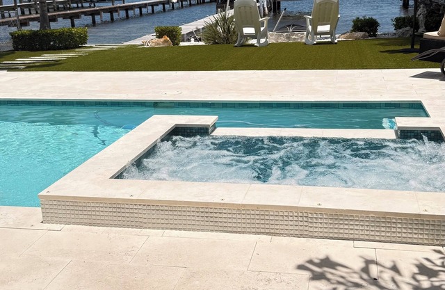 Beautiful bay home with one-of-a-kind water view, pool,spa, an a private pier.