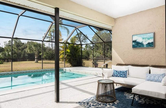 Beautiful Canal Front Home with Pool, Tennis Court