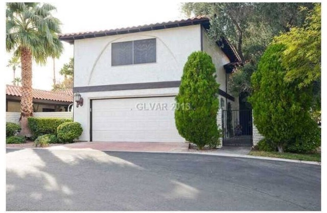 Beautiful gated community 4 bedroom 4 bath home located close to the Strip