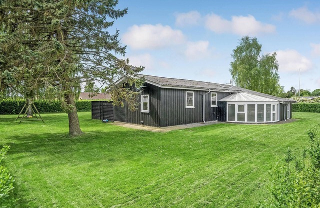 Beautiful home in Otterup with sauna