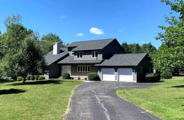 Beautiful, spacious home on four private acres