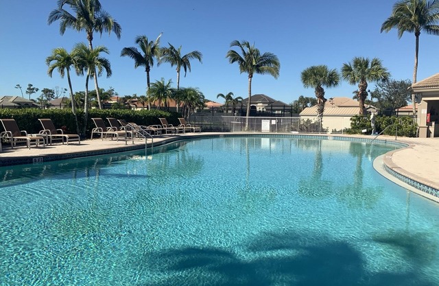 Beautiful sunset and water view home in Crown Colony gated community.