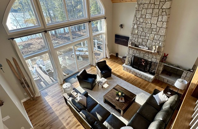 Beautiful waterfront home on quiet cove on Moose Pond. Perfect for 1-2 families