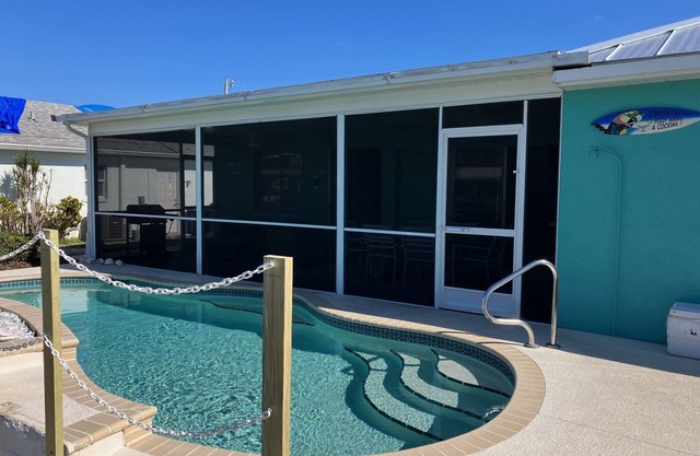 Beautiful waterfront home, newly refinished heated pool, dock, bikes, & kayaks!