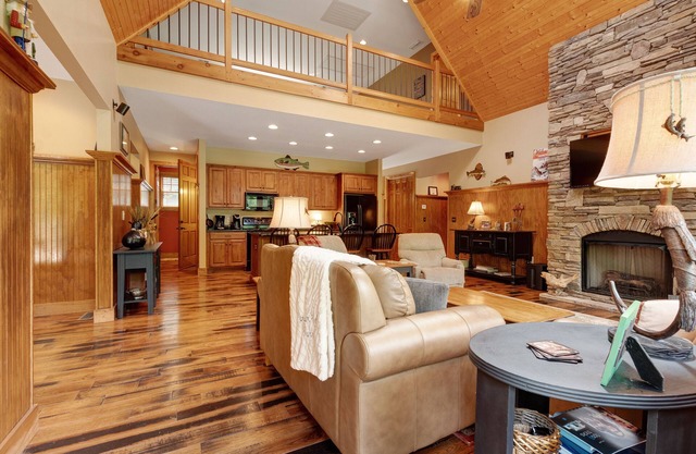 Beautiful, waterfront home w/high ceilings, a full kitchen, & a furnished deck