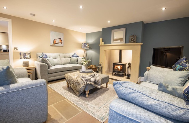 Beckside is a beautifully presented, Grade II listed three-bedroom cottage, bursting with character