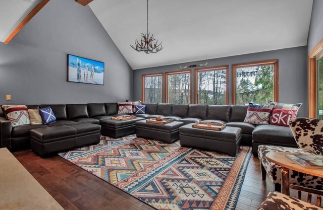 Best of both worlds; chalet located on a private lot in the pines and only 1 miles from the village!