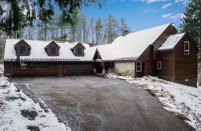 Best of both worlds; chalet located on a private lot in the pines and only 1 miles from the village!