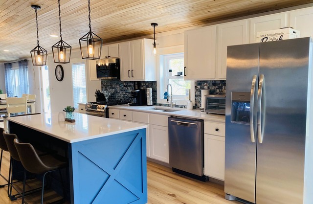 Best View on Torch lake! Private frontage, boat dock and across from the sandbar