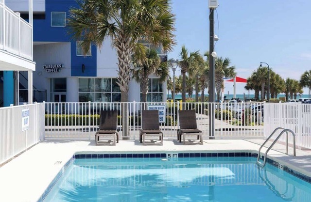 Boutique on the beach, Studio #109 + Pool
