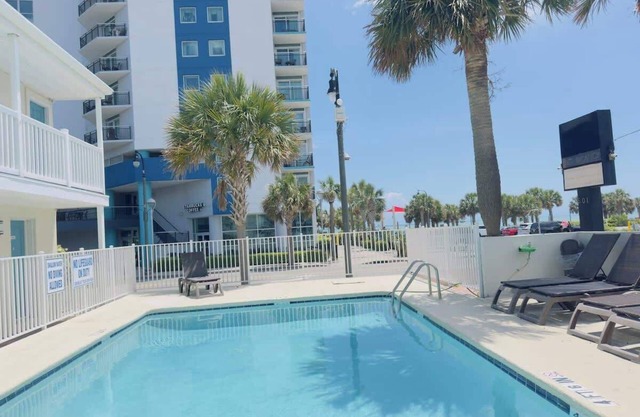 Boutique on the beach, Studio #124 + Pool