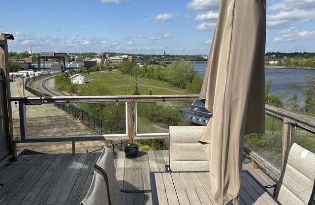 BRAND NEW LISTING! WATERFRONT APARTMENT WITH ROOF TOP DECK!
