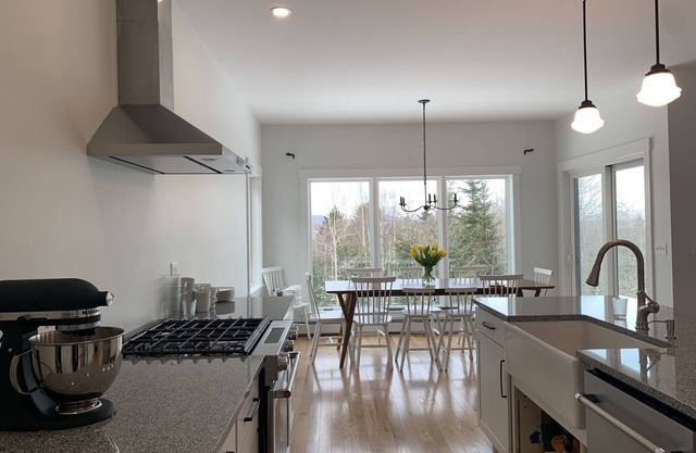 Brand new modern farmhouse with harbor views
