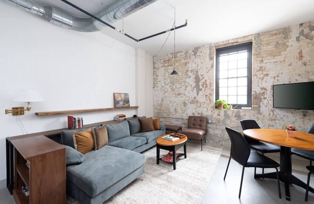 Brewery District 2-Story 2BR Apt Near Fiserv with Rooftop, Gym, and Parking