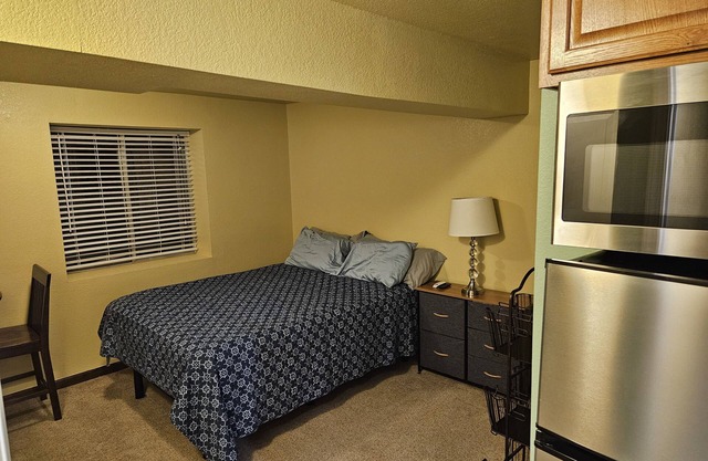 Bright and private basement studio with full laundry in rental.