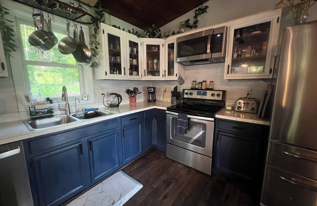Budget-friendly & full of charm, relax in our split-level home with views.