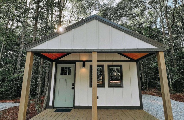 Cabin #1: Studio style layout with kitchenette and a large gravel parking pad beside the cabin for easy boat or trailer storage.