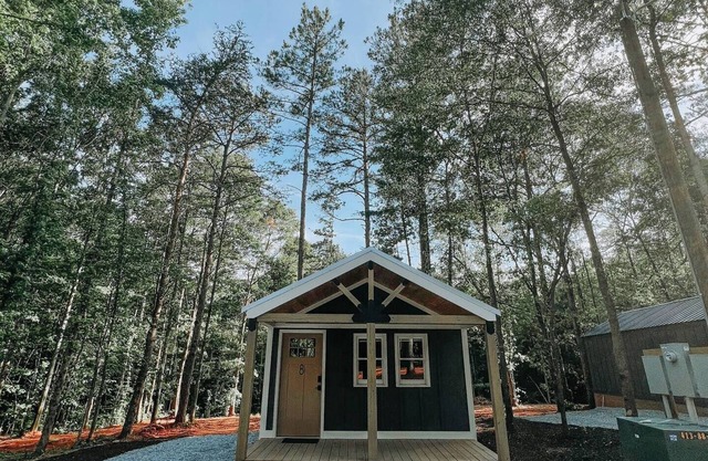 Cabin #8: Studio style layout with kitchenette and a large gravel parking pad beside the cabin for easy boat or trailer storage.