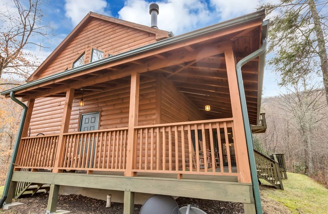 Cabin with hot tub in the mountains with creek.