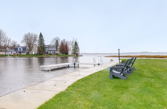 Cadillac Vacation Rental w/Dock on Lake Mitchell!