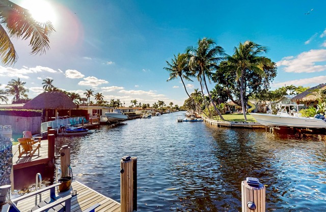 Canal-front home with private pool, dock, water views, amazing sunsets & fishing
