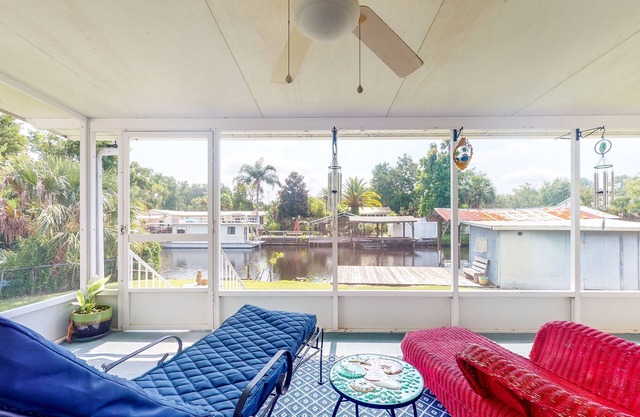Canal-Front Home with Private Covered Boat Dock & Waterfront Screened Porch