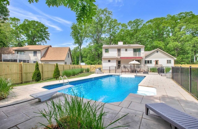 Caribbean HEATED POOL Home near Matapeake Beach!
