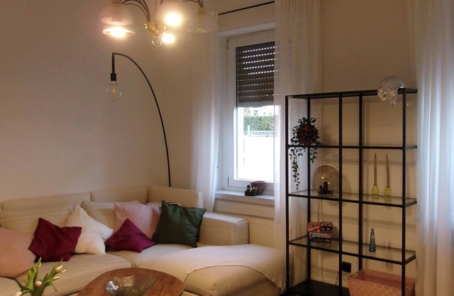 Central, cozy apartment with its own terrace and private parking space