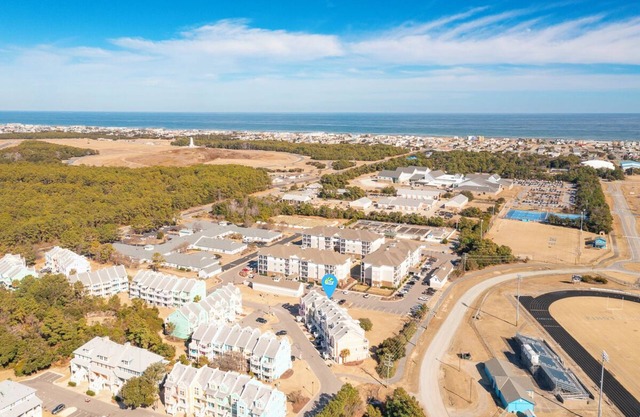 Centrally located townhome w/a resort-style community pool & gorgeous sunsets!
