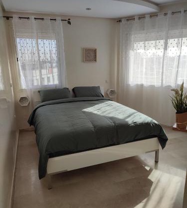 Chaleureux Appartement à 1 min à pied de la Mosquée Hassan II