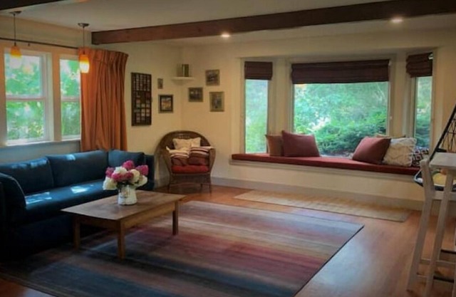Charming 1-bedroom cottage in a peaceful garden setting.