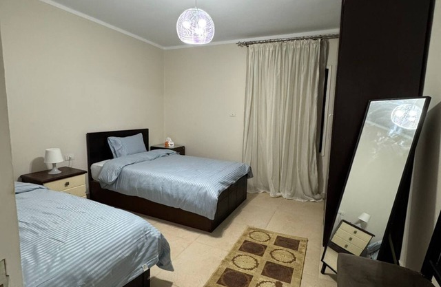 Charming 2-bedroom apartment with AC, WiFi in serene Cairo Governorate