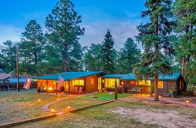 Charming home on 14 acres near town with patios, fire table, & 3 fireplaces