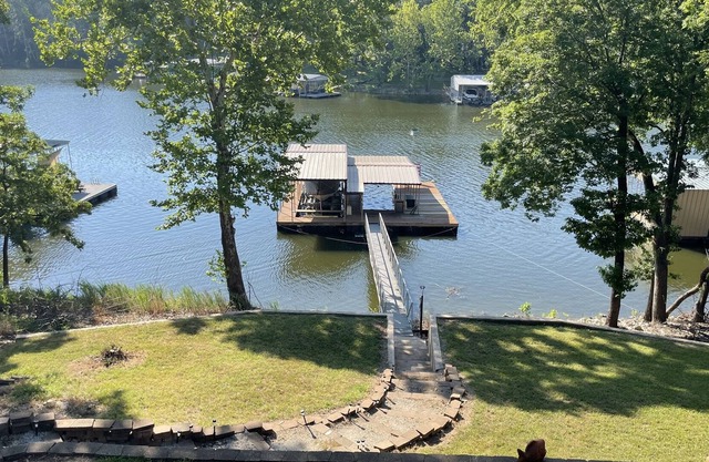 Charming Lakefront home, hot tub, fire table, dock and boat slip!