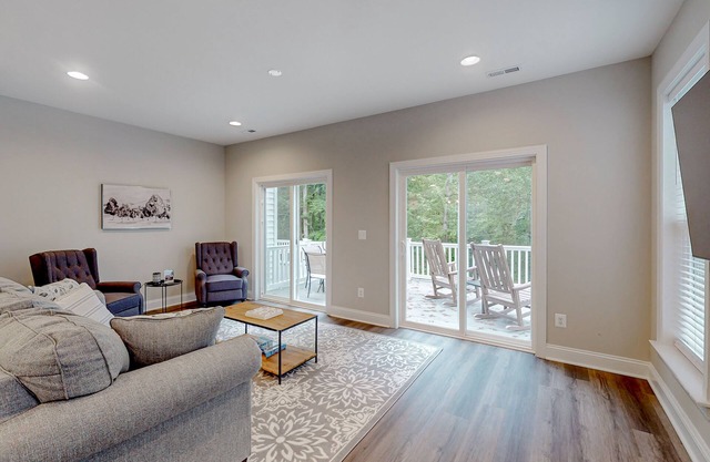 Charming lakefront retreat with game room and covered dock access