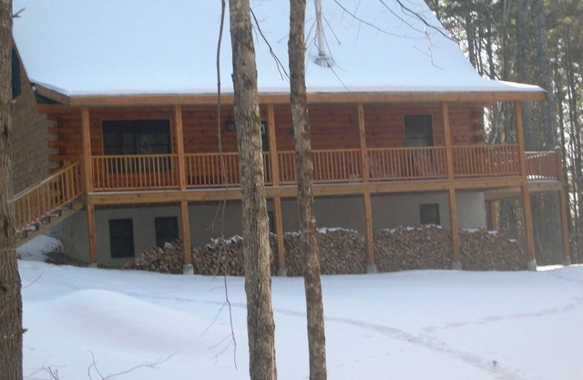 Charming log home, spacious yet cozy, nestled in the White Mountain region.