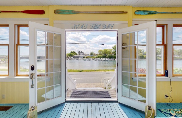 Charming waterfront home with patio, W/D, & amazing location