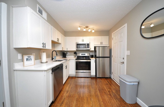 Cheerful 2-Bed Townhome Near Park w Garage Parking