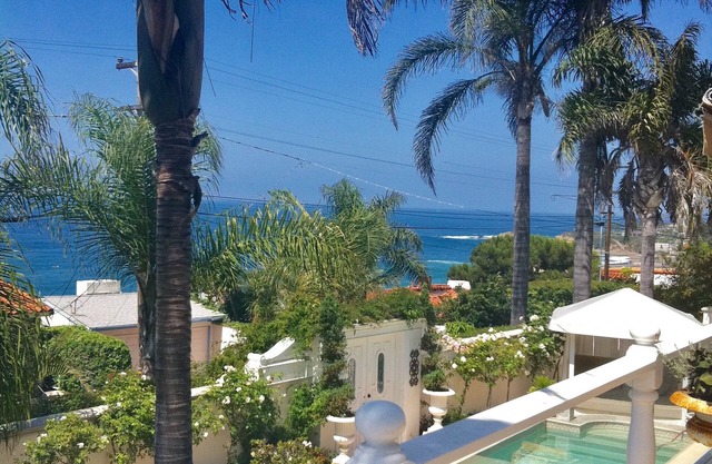 Chic Beach House on quiet street with pool & ocean views ...short walk to beach