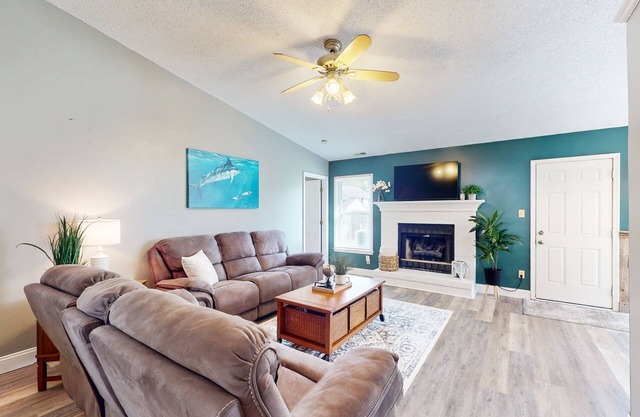Coastal home with privacy fence, a patio, close to beach and local attractions