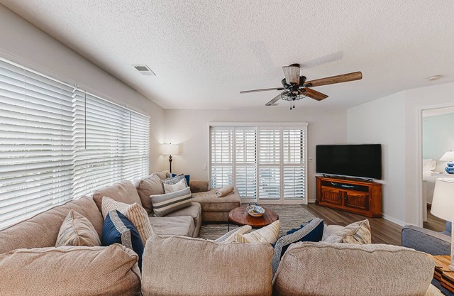 Coastal resort condo with on-site pools, hot tub, game room, & golf