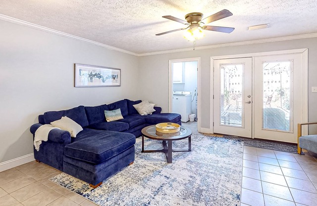 Coastal townhomes with private patio, full kitchen, near attractions, & W/D
