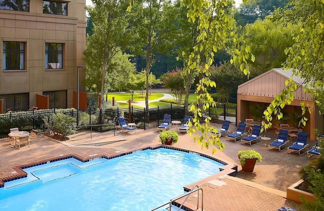 Comfort and Convenience! Parking, Pool Access! Close to McDaniel Farm Park!
