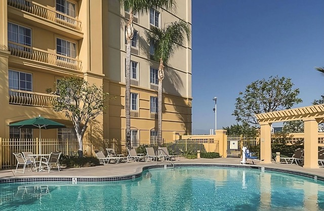 Comfort and Convenience! Enjoy Pool Access and Free Parking