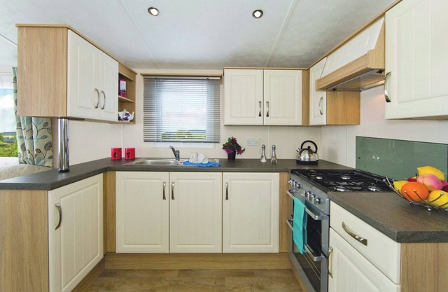Comfortable and spacious 12ft-wide caravan with one double and one twin.